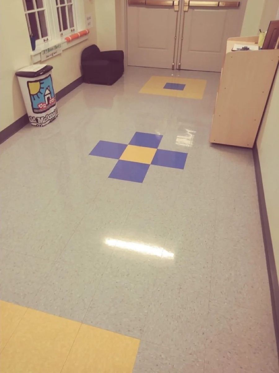 Freshly waxed school hallway floor